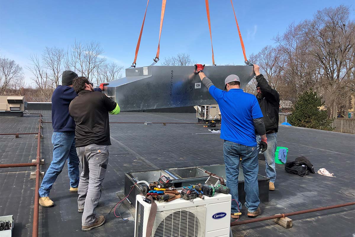 Herchenbach team working on an commercial install