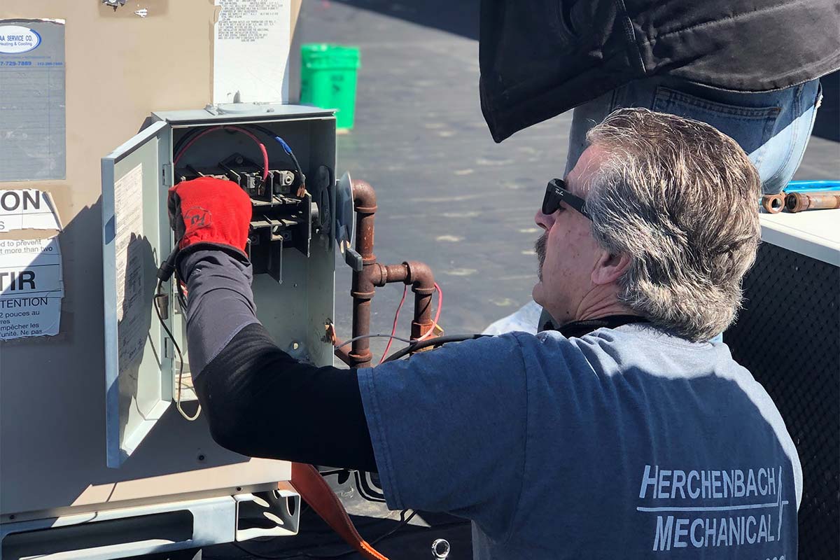 Herchenbach team working on a commercial install